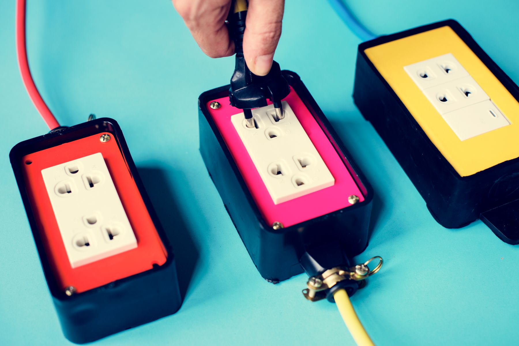 electrical-power-supply-plugs-on-blue-background-PX2WLYH (1)